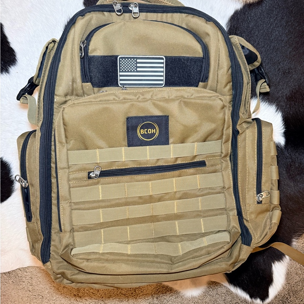 BCOH Dad’s Diaper Bag backpack with foldable bassinet